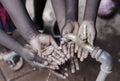 Clean Water Splashing Into African Child`s Hands Life Metaphore.