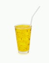Clean water yellow nectar sweet in a glass with ice white drinking straw isolated on white background. Royalty Free Stock Photo