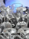 Clean wet drinking glasses at bar or dishwasher Royalty Free Stock Photo