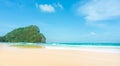 Clean white beach golden brown sand and blue sea under clear blue sky in a sunny day Royalty Free Stock Photo