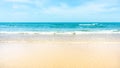 Clean white beach golden brown sand and small wave from blue sea under clear blue sky in a sunny day Royalty Free Stock Photo