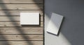Clean white cards mockup on textured wooden surface and gray wall Royalty Free Stock Photo