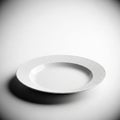 A clean white dinner plate with a ribbed rim casts a soft shadow on a white surface ceramic Royalty Free Stock Photo