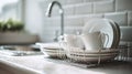 Clean White Dishes Drying On A Kitchen Counter With Sunlight. Home Kitchenware Organization And Cleanliness Royalty Free Stock Photo