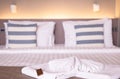 Clean white hotel towels on bed,Beautiful of fluffy bath towels Royalty Free Stock Photo