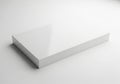 A clean white rectangular box or stack of paper isolated on a white background isolated on white background Royalty Free Stock Photo