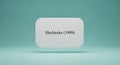 A modern minimalistic white button with Sheldrake 1999 text floats on a light green background for UI design concepts Royalty Free Stock Photo