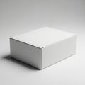 Clean White Rectangular Cardboard Box with Lid Slightly Ajar on a Light Gray Background Royalty Free Stock Photo