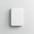 White rectangular object on a light gray surface Royalty Free Stock Photo