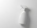 Clean white spray bottle with trigger dispenser on a plain light background Royalty Free Stock Photo