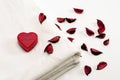 Clean White Towel with Heart Shape Soap and Rose Leafs Royalty Free Stock Photo