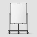 A clean, white, upright presentation whiteboard on a rolling stand, with minimalist design Royalty Free Stock Photo