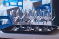 Clean wineglasses on tray in restaurant.