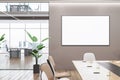 Clean wooden, concrete and glass meeting room interior with empty white mock up banner, furniture and partitions. Workplace