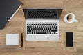Clean wooden office desk with laptop, smartphone, coffee, top view 3D Illustration