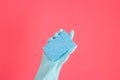 Cleaner concept, Hand in rubber gloves and holding light blue sponge for cleaning in home Royalty Free Stock Photo