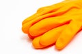 Cleaner concept, Orange rubber gloves for cleaning isolated on white background Royalty Free Stock Photo