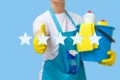 Cleaner shows on five star level of services. Royalty Free Stock Photo