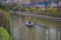 Cleaners on the qinhuai river in nanjing. Royalty Free Stock Photo