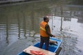 Cleaners on the qinhuai river in nanjing. Royalty Free Stock Photo