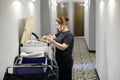 Cleaners trolley at hotel. Royalty Free Stock Photo