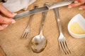 Cleanign silverware Royalty Free Stock Photo