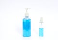 Blue colored cleansing alcohol in dispensor. Royalty Free Stock Photo