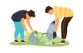 Cleaning area from garbage. Volunteers collect trash in field. People work together for recycling plastic waste in park Royalty Free Stock Photo
