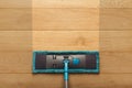 Cleaning background, mop washing wooden floor, before and after effect Royalty Free Stock Photo