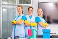 Cleaning brigade working in office Royalty Free Stock Photo