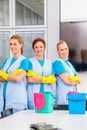 Cleaning brigade working in office Royalty Free Stock Photo