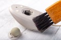 Cleaning with a brush of an old mouse. Office accessories for work Royalty Free Stock Photo