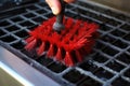 cleaning brush scrubbing refrigerator grates