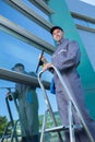 Cleaning building glass walls Royalty Free Stock Photo