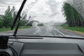 Cleaning the car`s windshield with a windscreen wiper Royalty Free Stock Photo