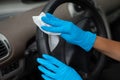 Cleaning car wit antibacterial wet wipes Royalty Free Stock Photo