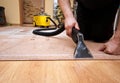 Cleaning carpet services detail with yellow machine Royalty Free Stock Photo