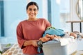 Cleaning, cleaner and woman with laundry, clothes washing and cleaner service, housekeeping and hygiene. Wash fabric