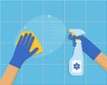 Cleaning concept. Hand in blue rubber glove cleans the tile with sponge and cleaning spray. Cleaning service background design. Royalty Free Stock Photo