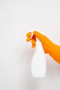 Cleaning concept, Hand in rubber gloves and holding spray bottle isolated on white background Royalty Free Stock Photo