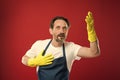 Cleaning day today. Bearded guy cleaning home. On guard of cleanliness and order. Cleaning service and household duty Royalty Free Stock Photo