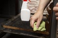 Cleaning a dirty oven for cooking.Household work in the kitchen Royalty Free Stock Photo