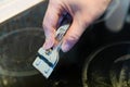 Cleaning dirty surface of black ceramic hob