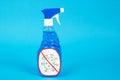 Cleaning disinfectant in bottle with spray that destroys germs, bacteria and viruses on surface of furniture, household appliance