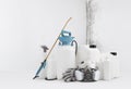 Cleaning and disinfection tools kit, isolated on white wall with mold background. Protective respirator mask, manual pump