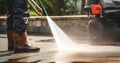 Cleaning driveway, clean dirty powerful, road washing, Royalty Free Stock Photo
