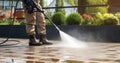 Cleaning driveway, clean dirty powerful, road washing, Royalty Free Stock Photo