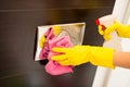 Cleaning flush button in toilet Royalty Free Stock Photo