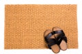Cleaning foot carpet with sandals welcome home Royalty Free Stock Photo