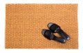 Cleaning foot carpet with sandals welcome home Royalty Free Stock Photo